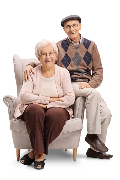 Ανώτερος ζευγάρι κάθεται σε μια πολυθρόνα — Φωτογραφία Αρχείου