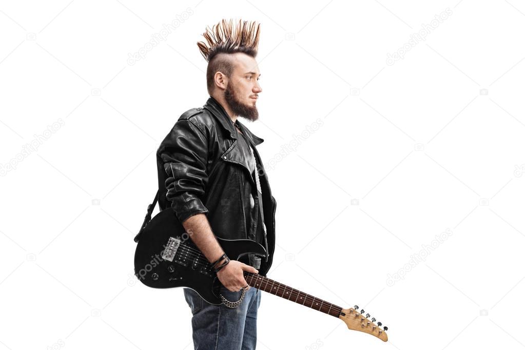 Punk rocker holding an electric guitar