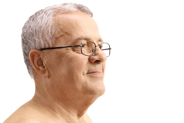Volwassen man met bril op zoek weg — Stockfoto