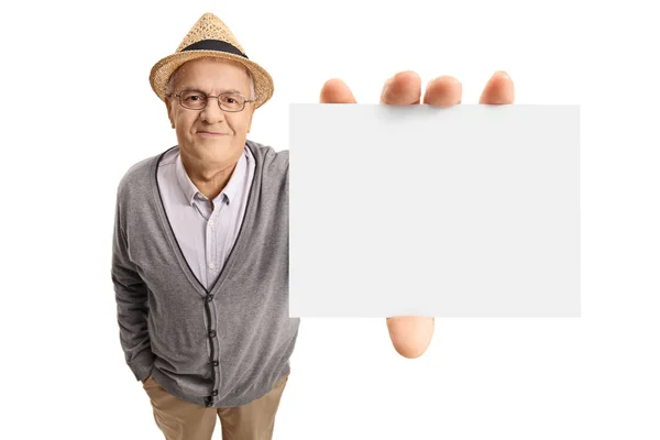 Mature man showing a blank card — Stock Photo, Image