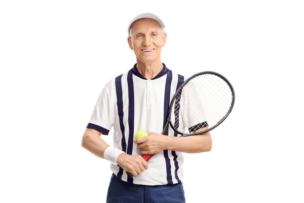 Senior s tenisovou raketu a míček — Stock fotografie