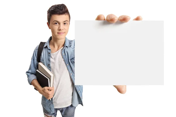 Teenage student visar ett tomt kort — Stockfoto
