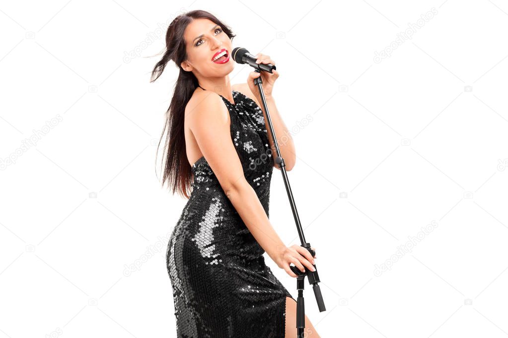 Female singer singing on a microphone