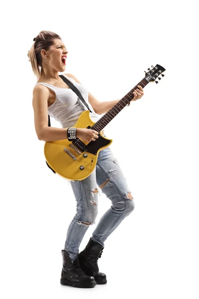 Punk girl singing and playing an electric guitar — Stock Photo, Image