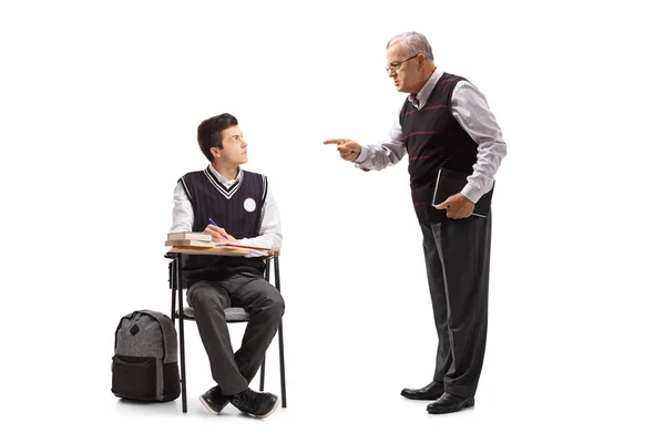 Teacher scolding a teenage student — Stock Photo, Image