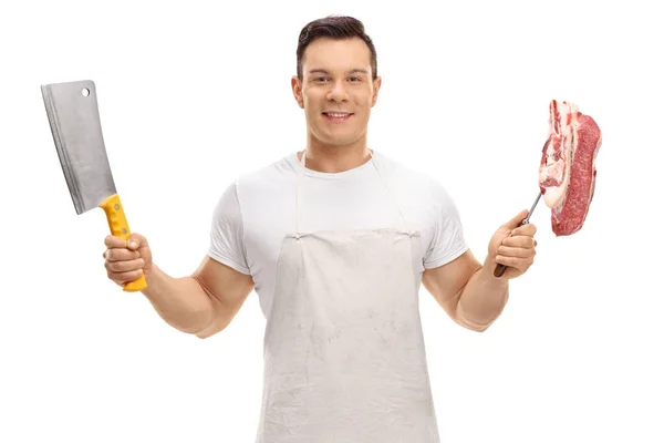 Butcher holding a cleaver and a steak — Stock Photo, Image