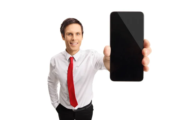 Joven hombre de negocios mostrando un teléfono —  Fotos de Stock