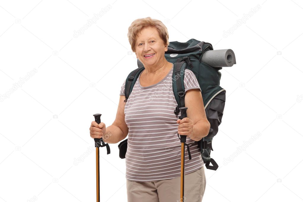 Elderly female hiker with hiking equipment