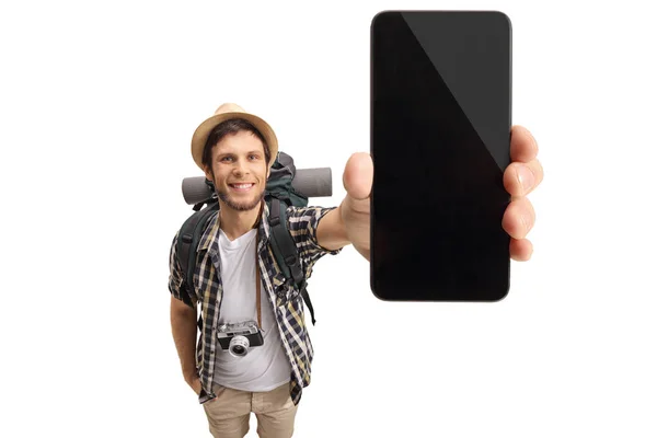 Touristin zeigt Handy — Stockfoto