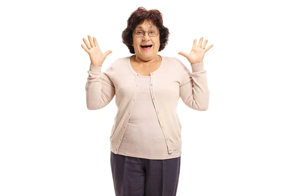 Surprised senior lady gesturing with her hands — Stock Photo, Image