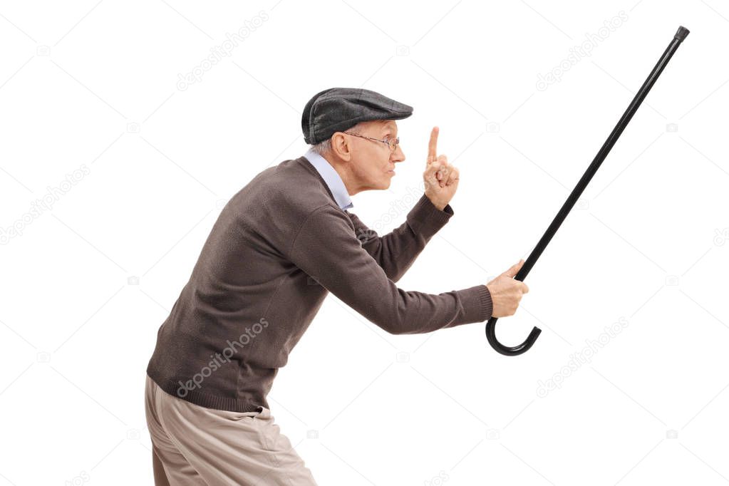 senior holding his cane as a sword and gesturing