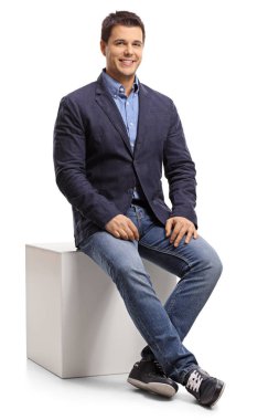 Bir küp üzerinde oturan zarif adam