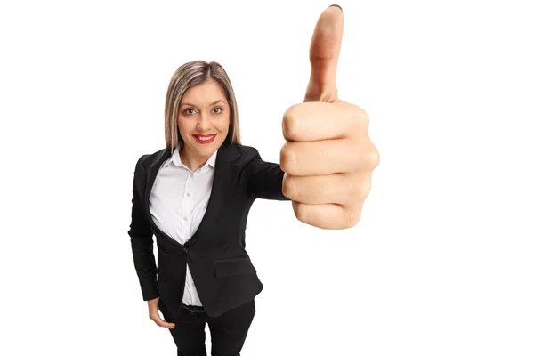 Elegant woman making a thumb up sign Stock Picture