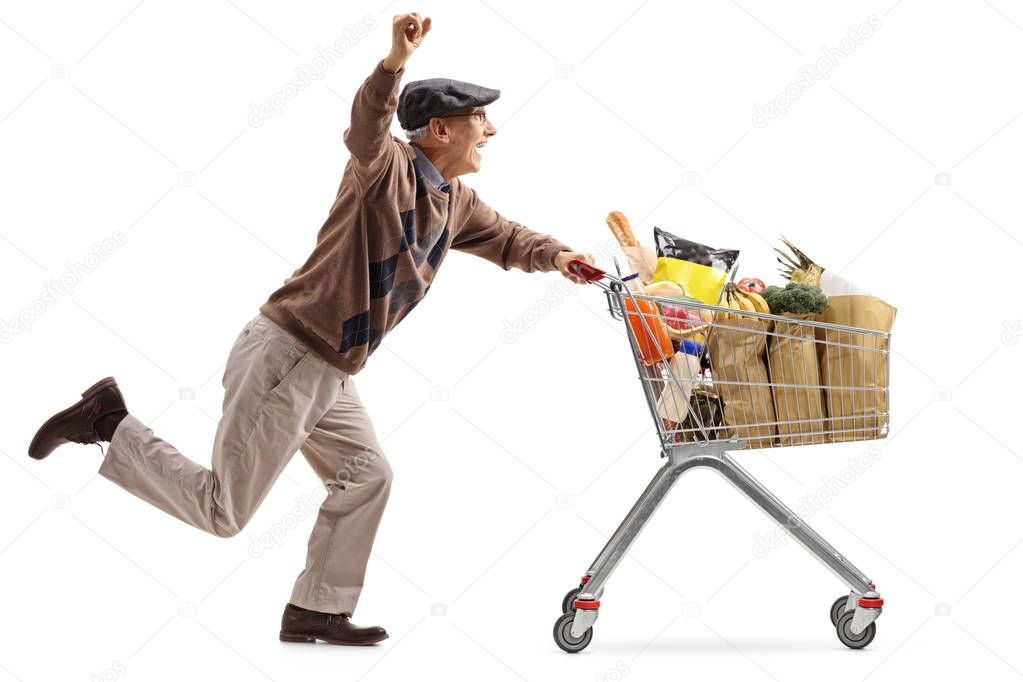man pushing a shopping cart filled with groceries