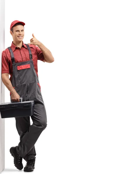 Reparateur met een toolbox bellen me gebaar — Stockfoto