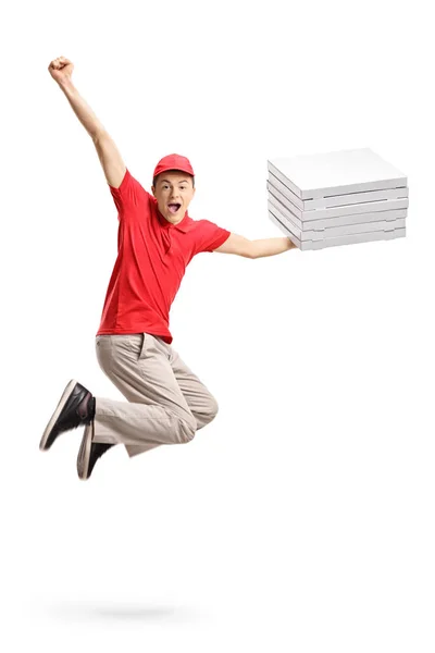 Pizza delivery boy jumping and gesturing happiness — Stock Photo, Image