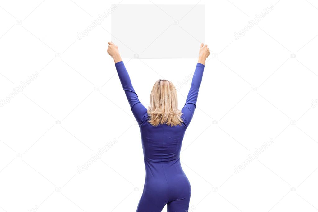 woman holding a blank sign