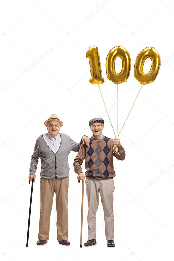 elderly men with a number hundred balloons