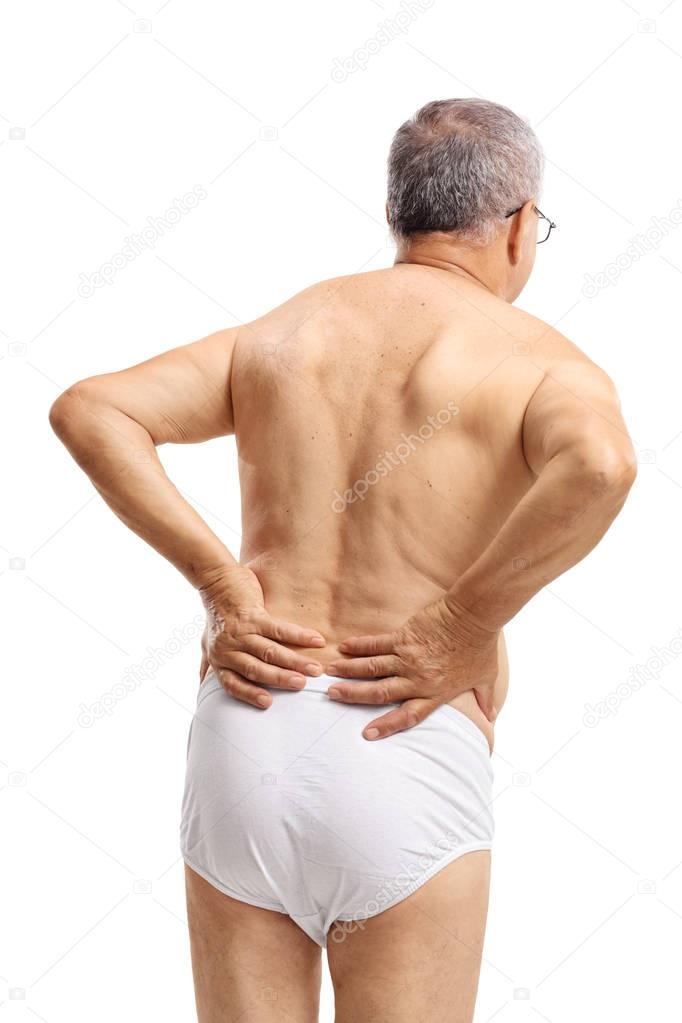 Shirtless senior experiencing back pain