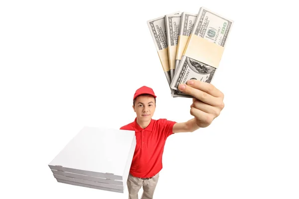 Rapaz de entrega de pizza com pacotes de dinheiro — Fotografia de Stock