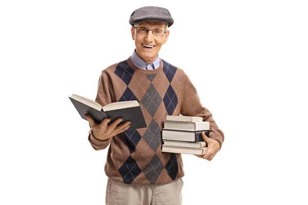 Starší muž s knihami — Stock fotografie
