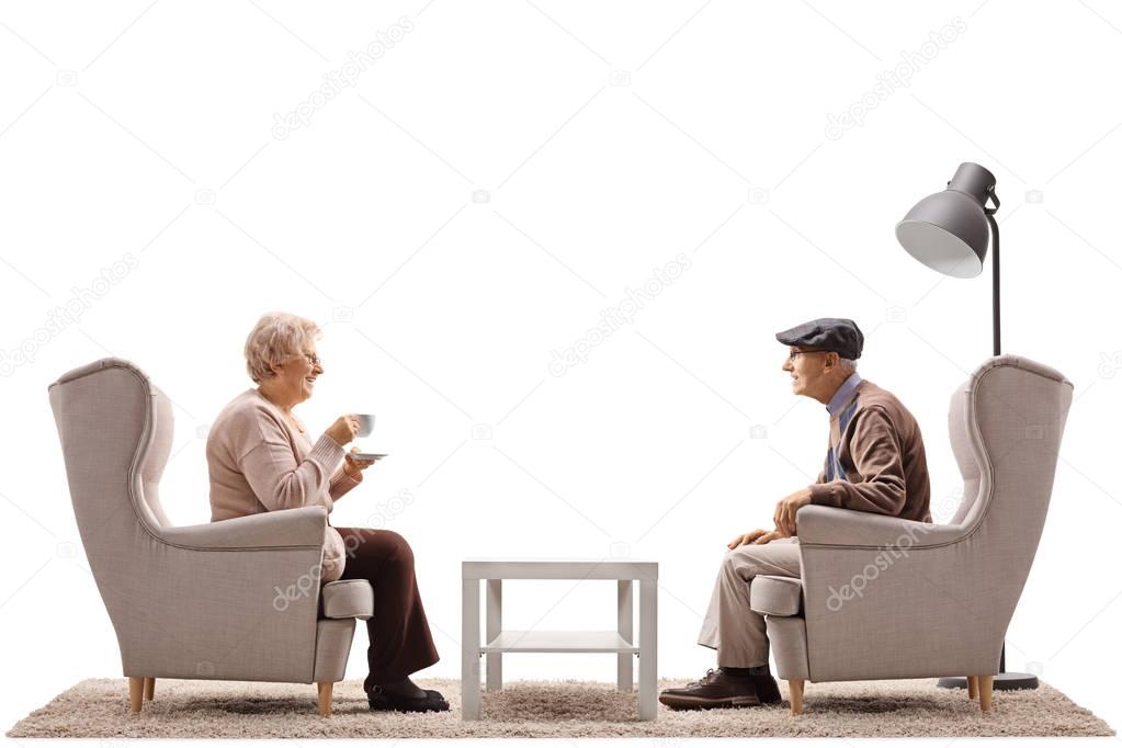 woman with a cup and an man having a conversation