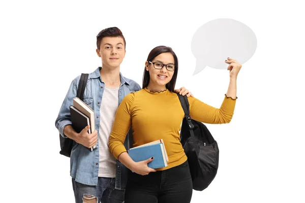 Studenti adolescenti con libri e una bolla di chat — Foto Stock