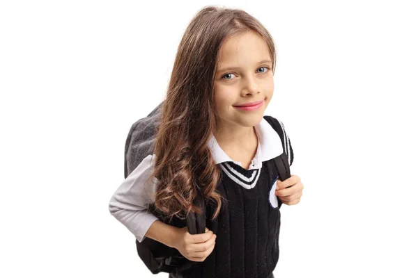 Little schoolgirl looking at the camera and smiling — Stock Photo, Image