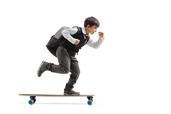 Schoolboy naik longboard — Stok Foto