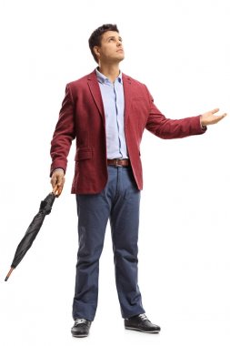 adam bir şemsiye yağmur yağıyor görmek için kontrol ile