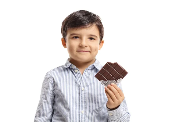 Boy holding a bitten chocolate bar — Stock Photo, Image