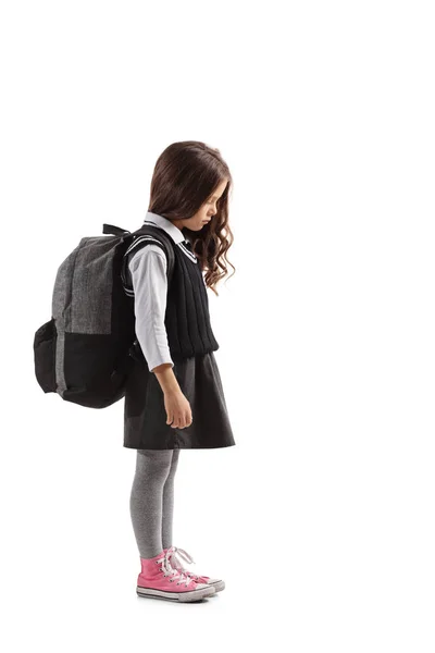 Trauriges kleines Schulmädchen mit Rucksack — Stockfoto