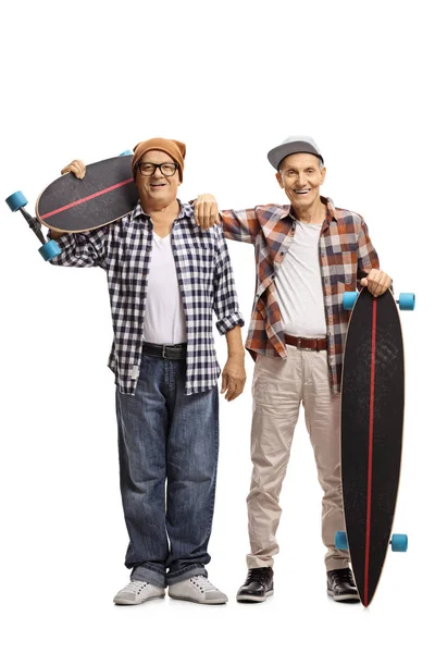 Elderly skaters with longboards — Stock Photo, Image