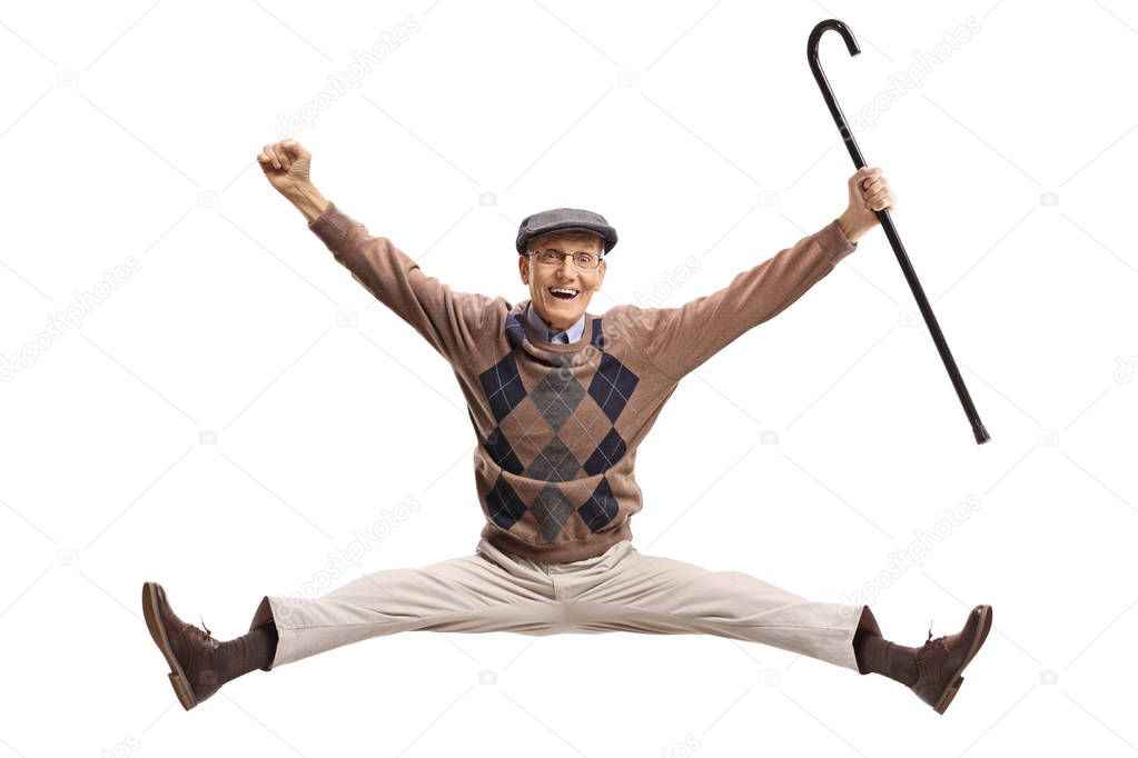 Overjoyed senior with a cane jumping