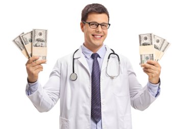 Para demetleri holding ve gülümseyen bir doktor