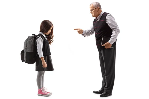 Old teacher scolding a schoolgirl — Stock Photo, Image