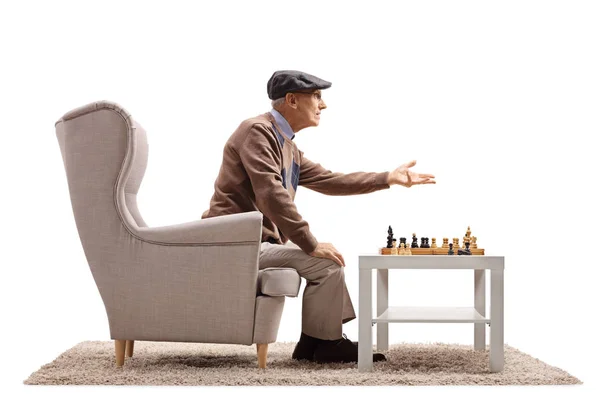 Man playing a game of chess and arguing with someone — Stock Photo, Image