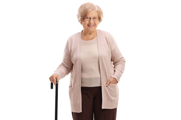 woman with a walking cane smiling