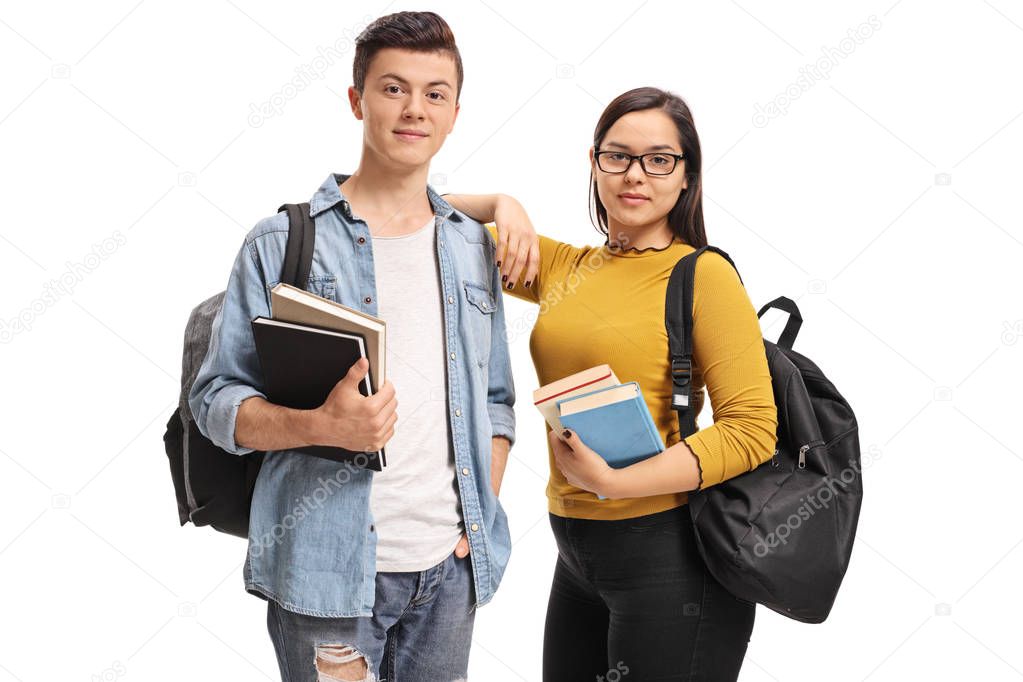 Teenage students with backpacks and books isolated on white background