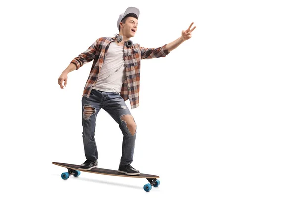 Full Length Portrait Teenage Hipster Riding Longboard Making Peace Sign — Stock Photo, Image