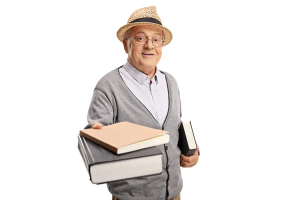 Mature Man Giving Books Isolated White Background — Stock Photo, Image