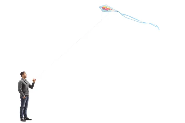 Full Length Profile Shot Young Guy Flying Kite Isolated White — Stock Photo, Image