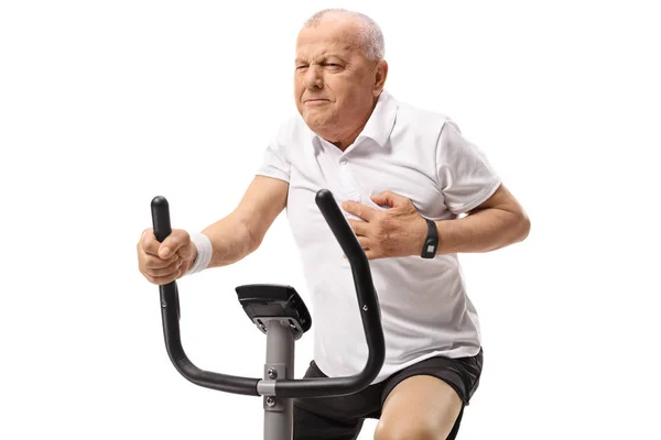Зрелый Человек Работает Велотренажере Сердечный Приступ Изолирован Белом Фоне — стоковое фото