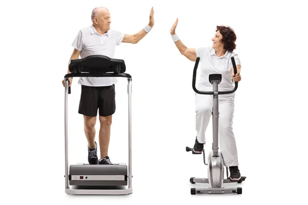 Full Length Profile Shot Elderly Man Elderly Woman Exercising High — Stock Photo, Image