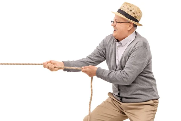 Senior Tirando Una Corda Isolata Sfondo Bianco — Foto Stock