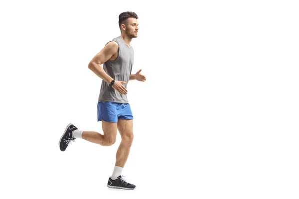 Full Length Profile Shot Guy Jogging Isolated White Background — Stock Photo, Image
