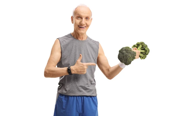 Elderly Man Holding Broccoli Dumbbell Pointing Isolated White Background — Stock Photo, Image