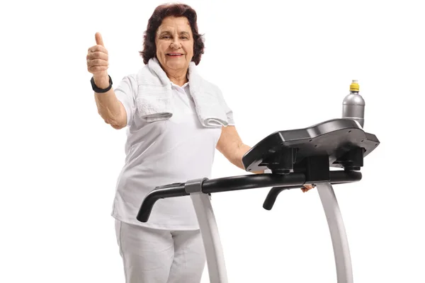 Mature Woman Treadmill Making Thumb Gesture Isolated White Background — Stock Photo, Image