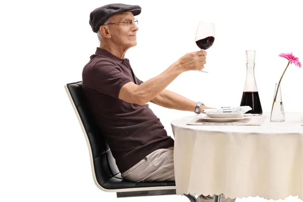 Senior Seated Restaurant Table Tasting Red Wine Isolated White Background — Stock Photo, Image