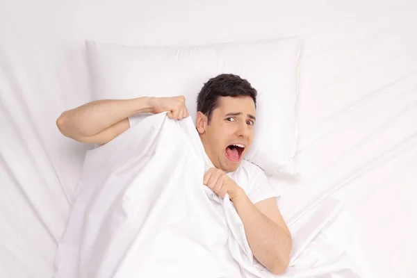 Terrified Young Man Lying Bed Screaming — Stock Photo, Image